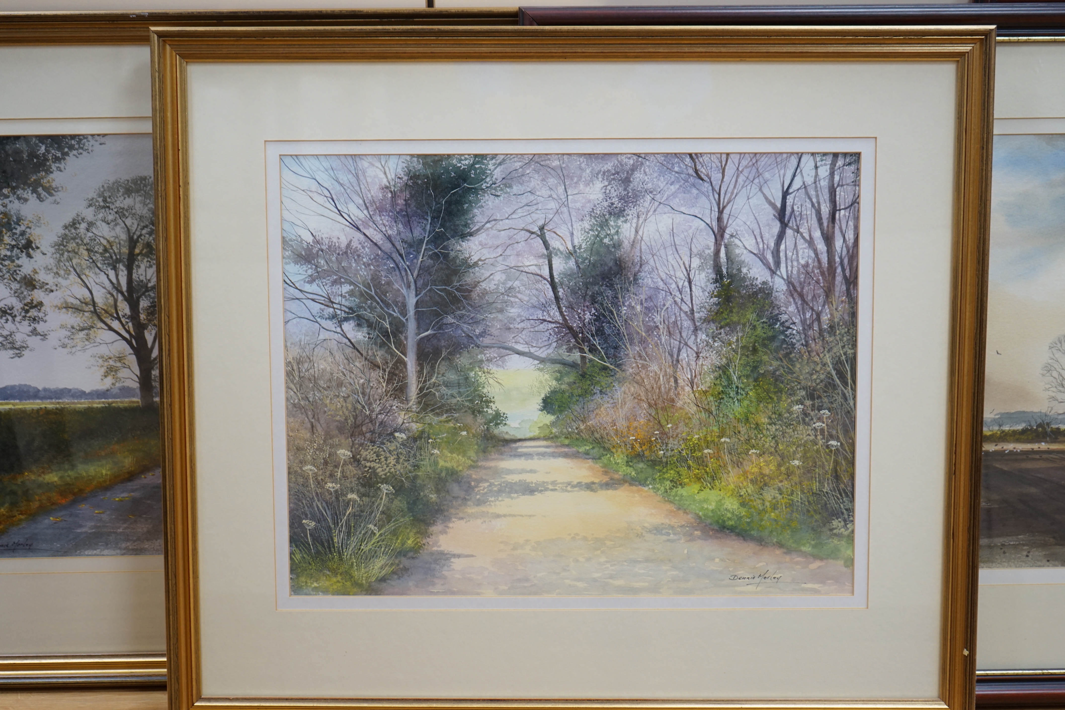 Dennis Morley (b.1929), two pairs of watercolours, Winter & Autumn landscapes and country pathways, each signed, 45cm x 35cm (4)